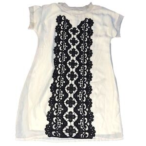 Chic White Dress with Black Lace Detail